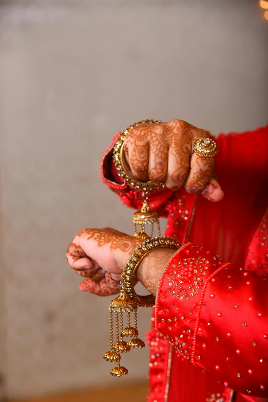 the bride is preparing to perform her wedding ceremony