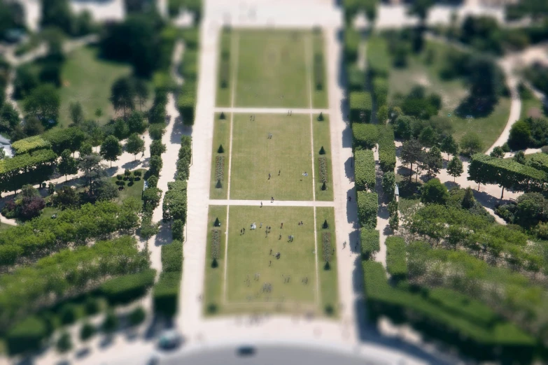 a bird - eye view of an aerial tennis field with trees