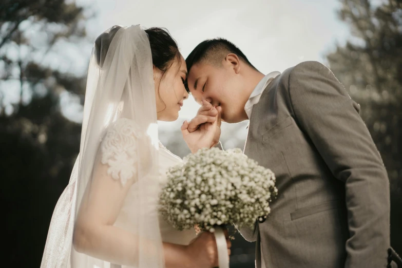 a man and woman pose for a po together