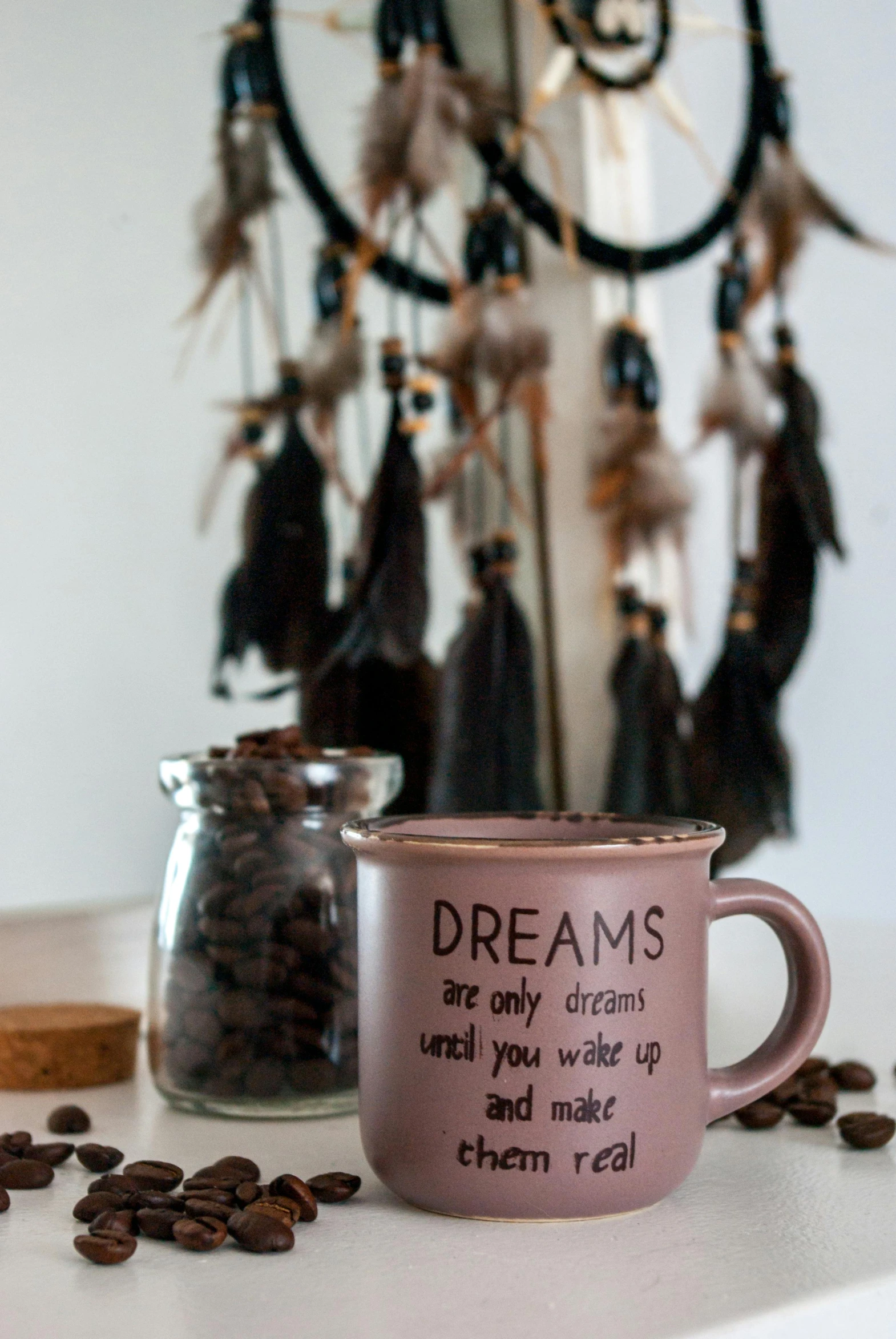 a cup sitting on top of a white table