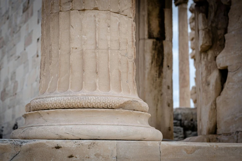 a stone pillar with one piece of writing on the outside