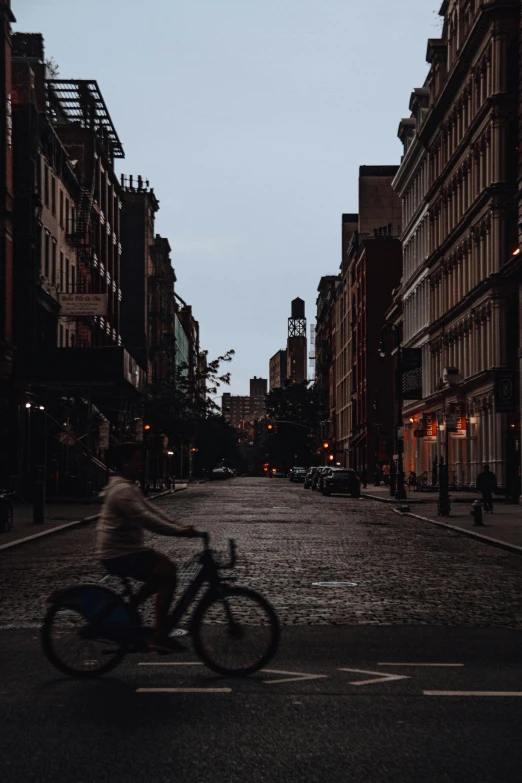 this person is riding their bike on the street