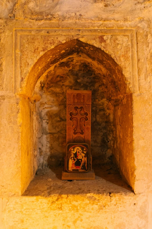 a wooden case on the floor of a tunnel