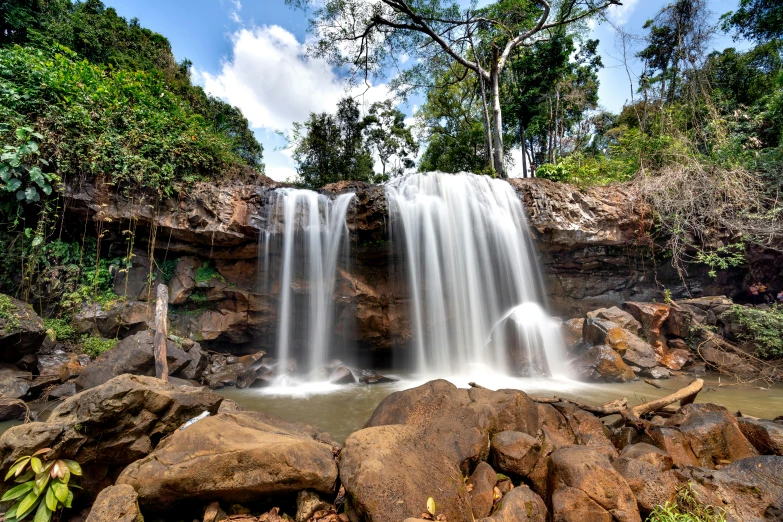 the waterfall in the distance with water flowing from it