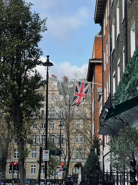 the flags on the building are flying high