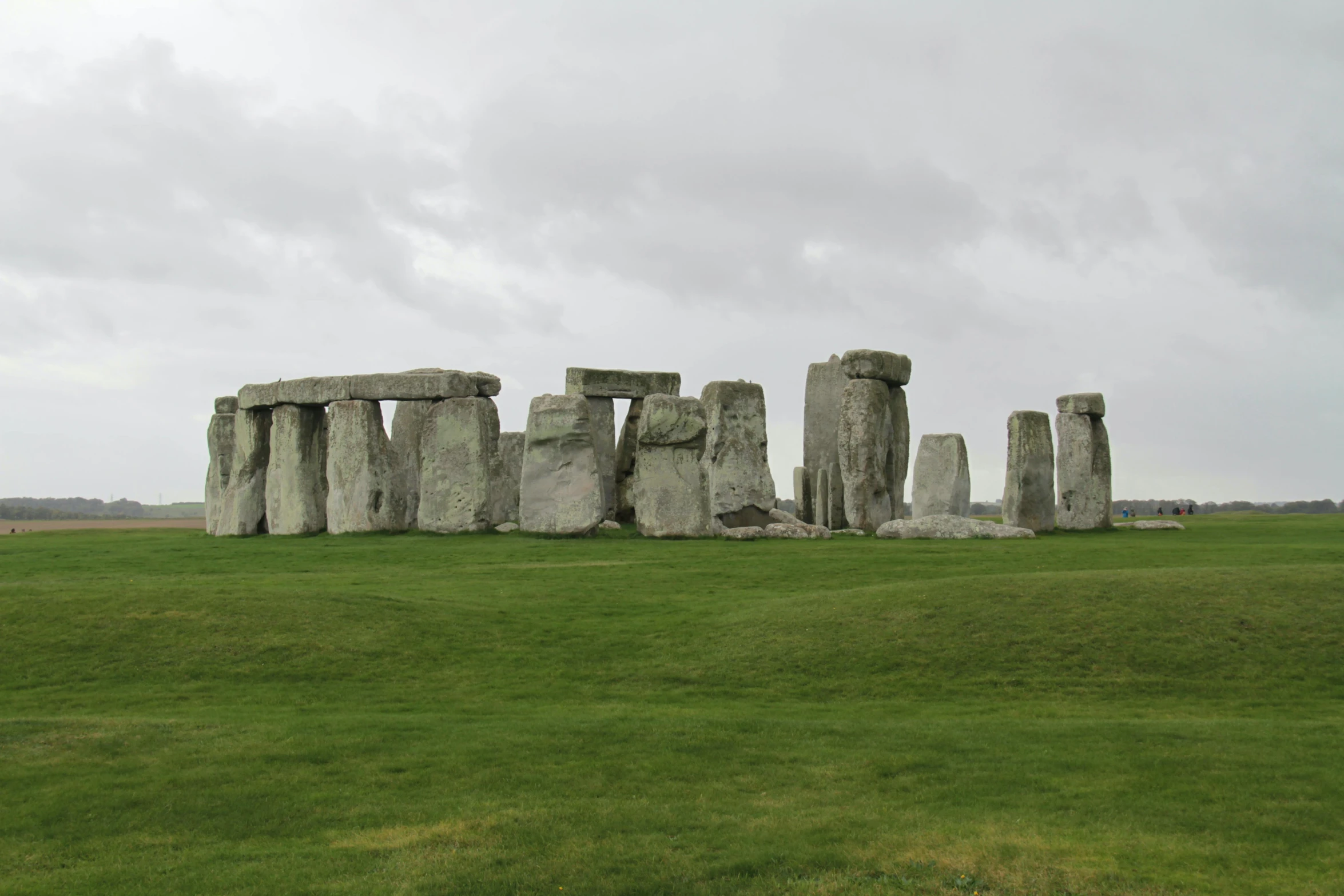 a large field with stones in the middle of it