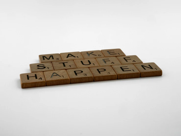 a word spelled out with wooden letters on a table