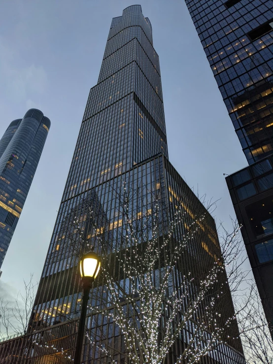 a building with large windows that is lit up