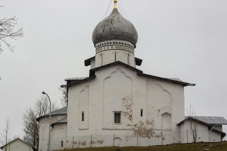 an old abandoned building with a big domed dome