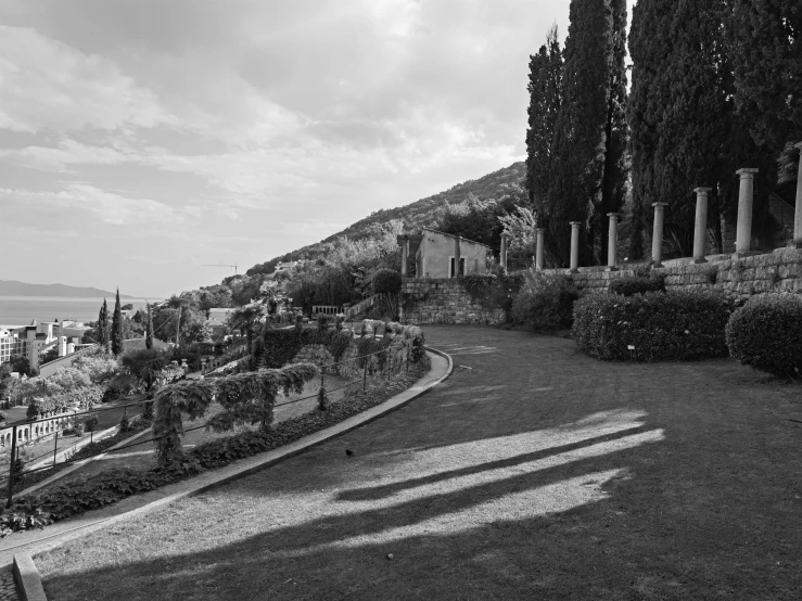 a black and white image of the landscape at twilight