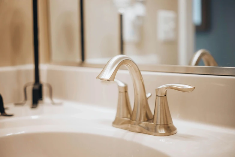 closeup of modern bathroom sink with faucet