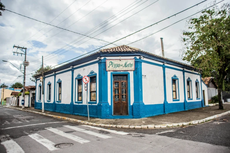 the old town has a small blue and white building