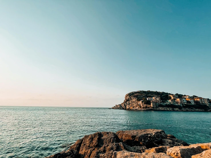 a large body of water surrounded by rocky shores