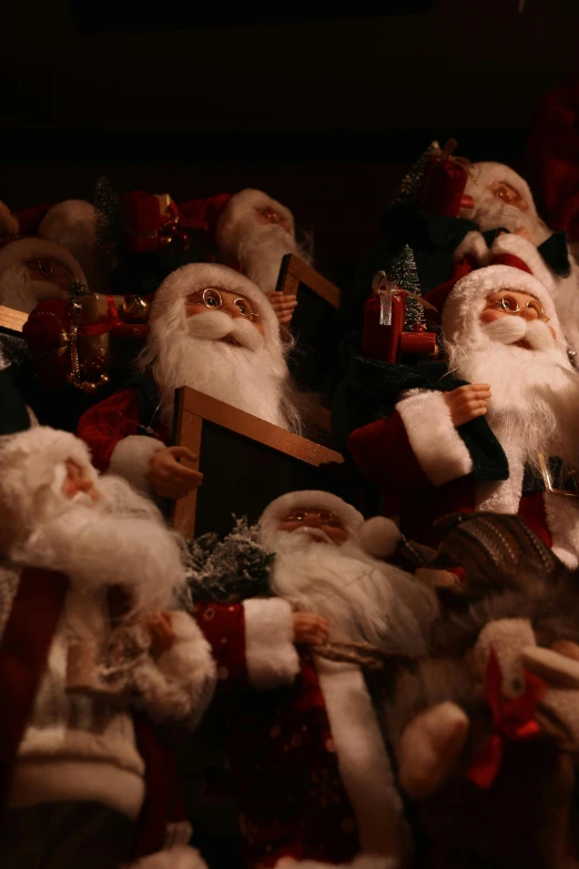 an array of santa clauss are stacked together