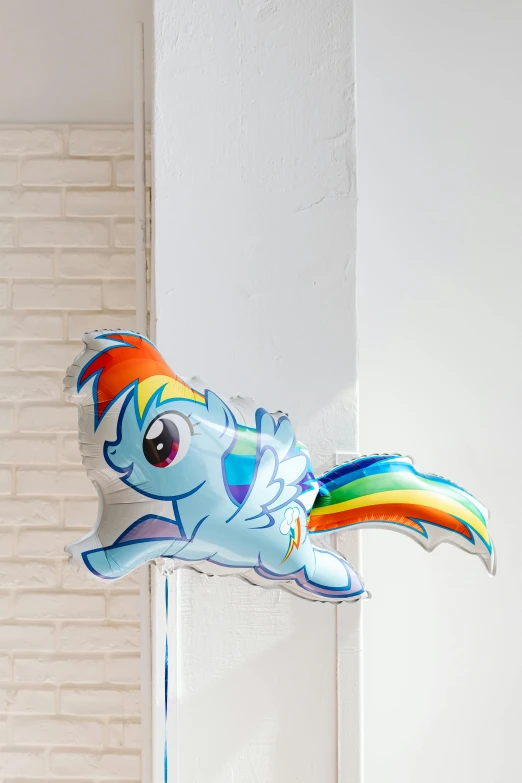 a balloon shaped like a pony in the shape of a fish