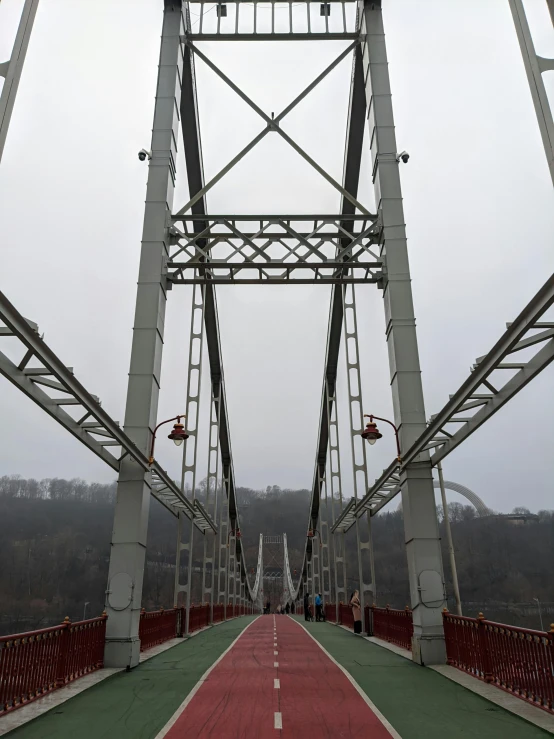 this is an overhead view of a bridge with a red floor