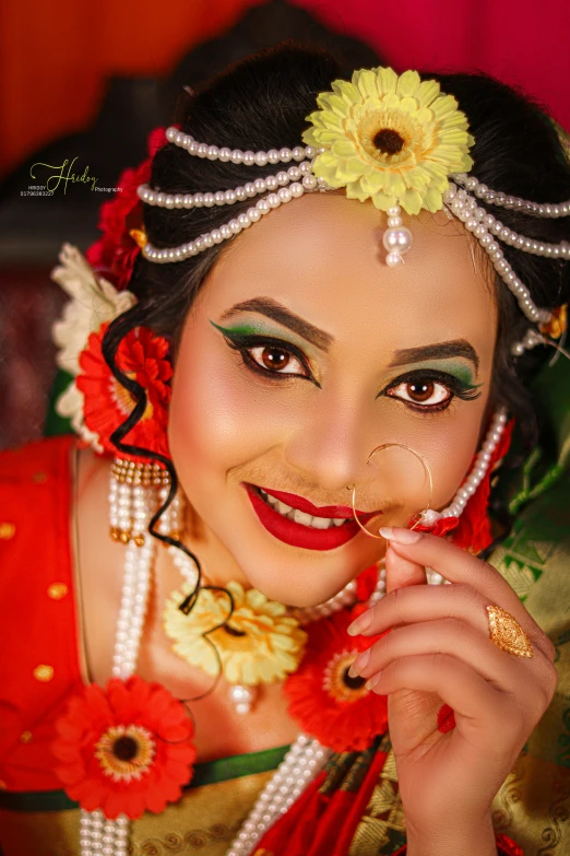 a young woman is dressed in an asian style costume