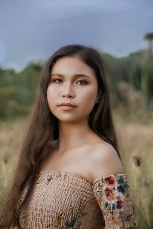 a young woman in a dress is posing for a po