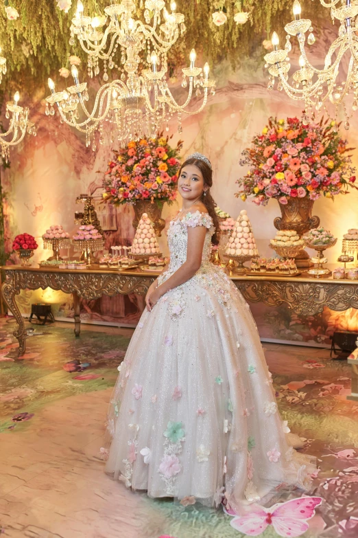 a woman posing for the camera wearing a wedding gown