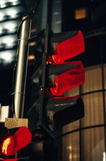 an image of a traffic signal light that appears red