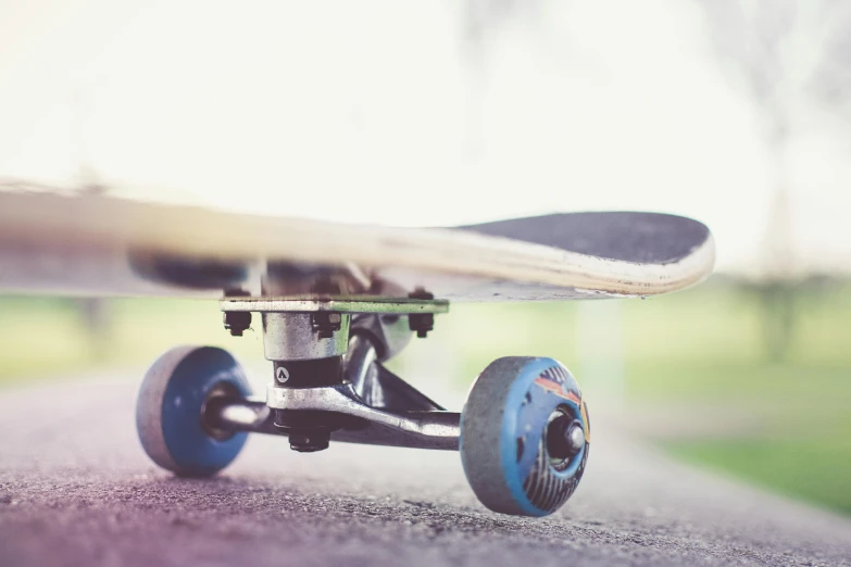 there is a skateboard that is sitting on a street