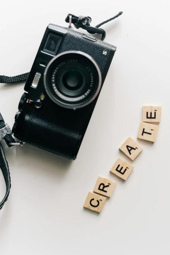 an image of a camera and some type of word that reads create