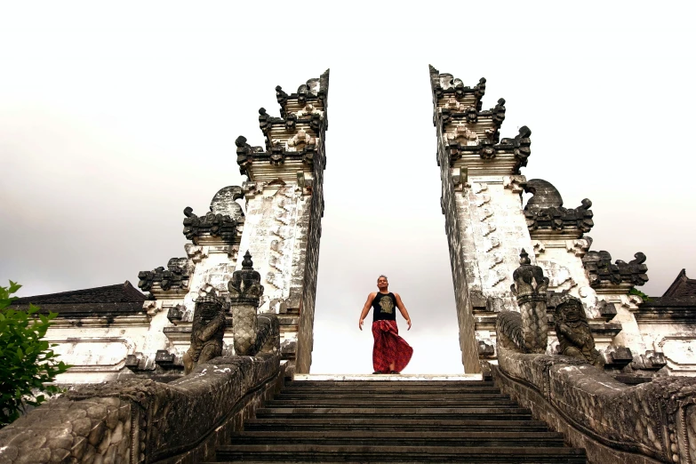 a woman walking down a set of stairs