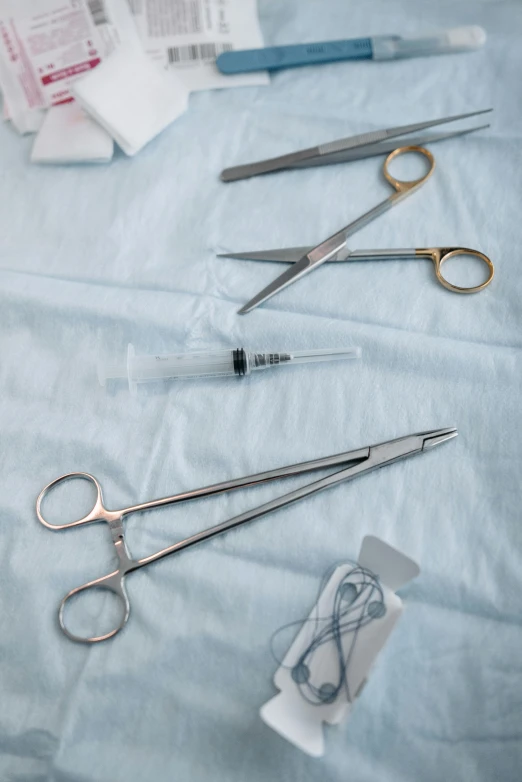 scissors that are on a table with scissors