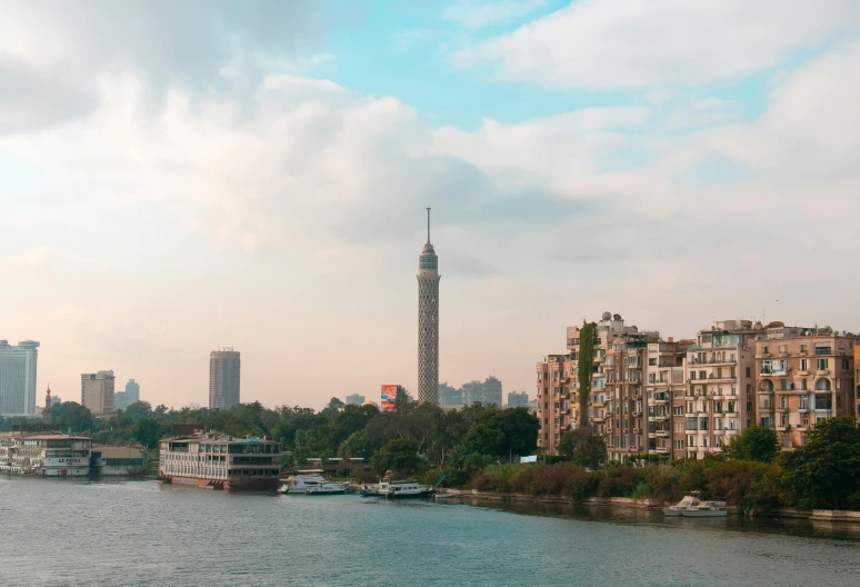 a beautiful view of buildings and boats on a body of water