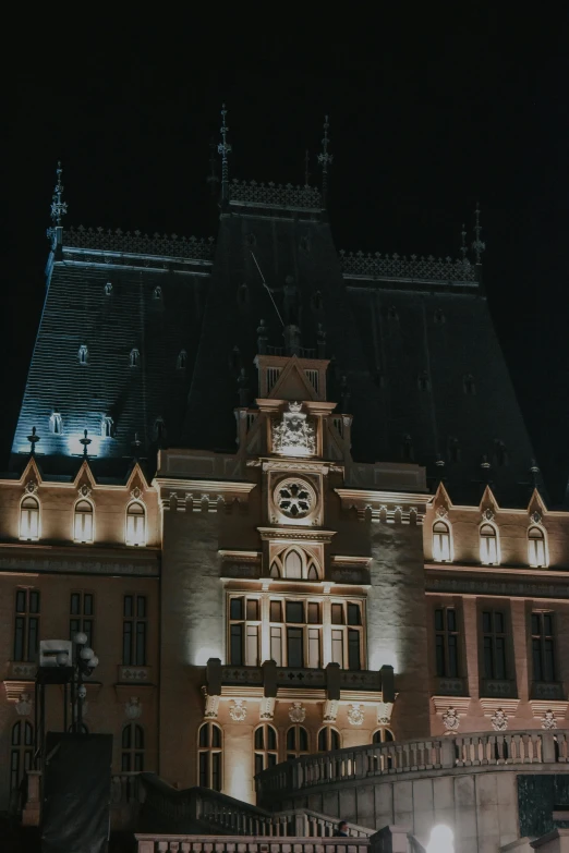 the clock tower on a building at night