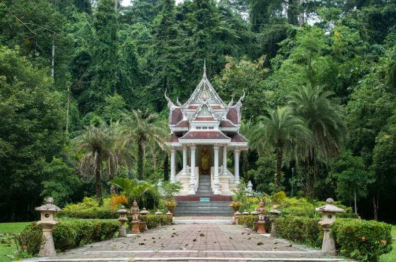 an image of a garden setting with a gazebo