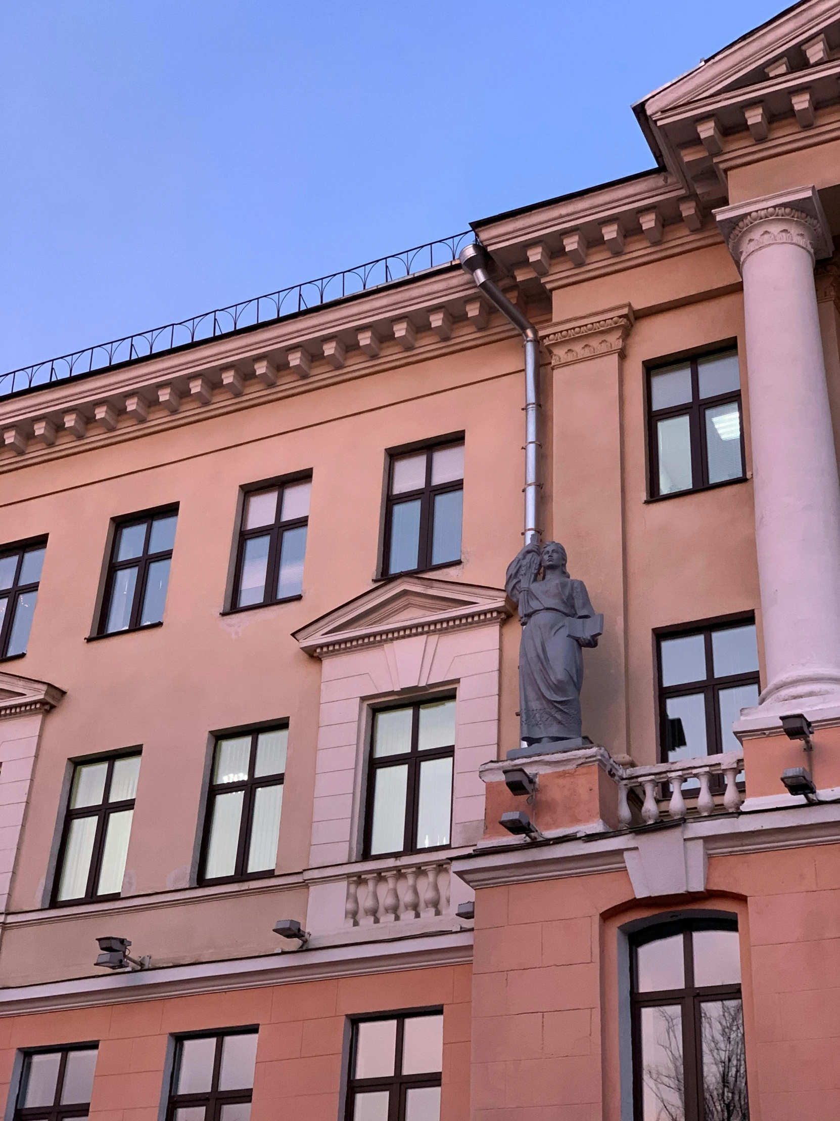 the large building with many windows is brown