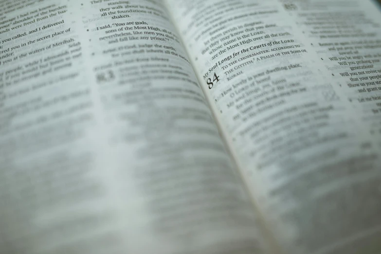 a close up of an open book with text on it