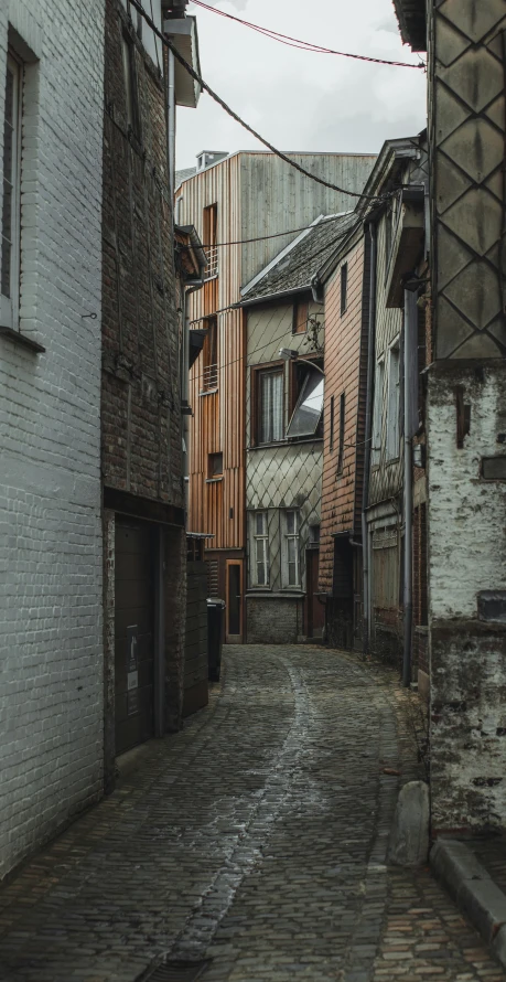 the cobblestone road in the old city is very narrow