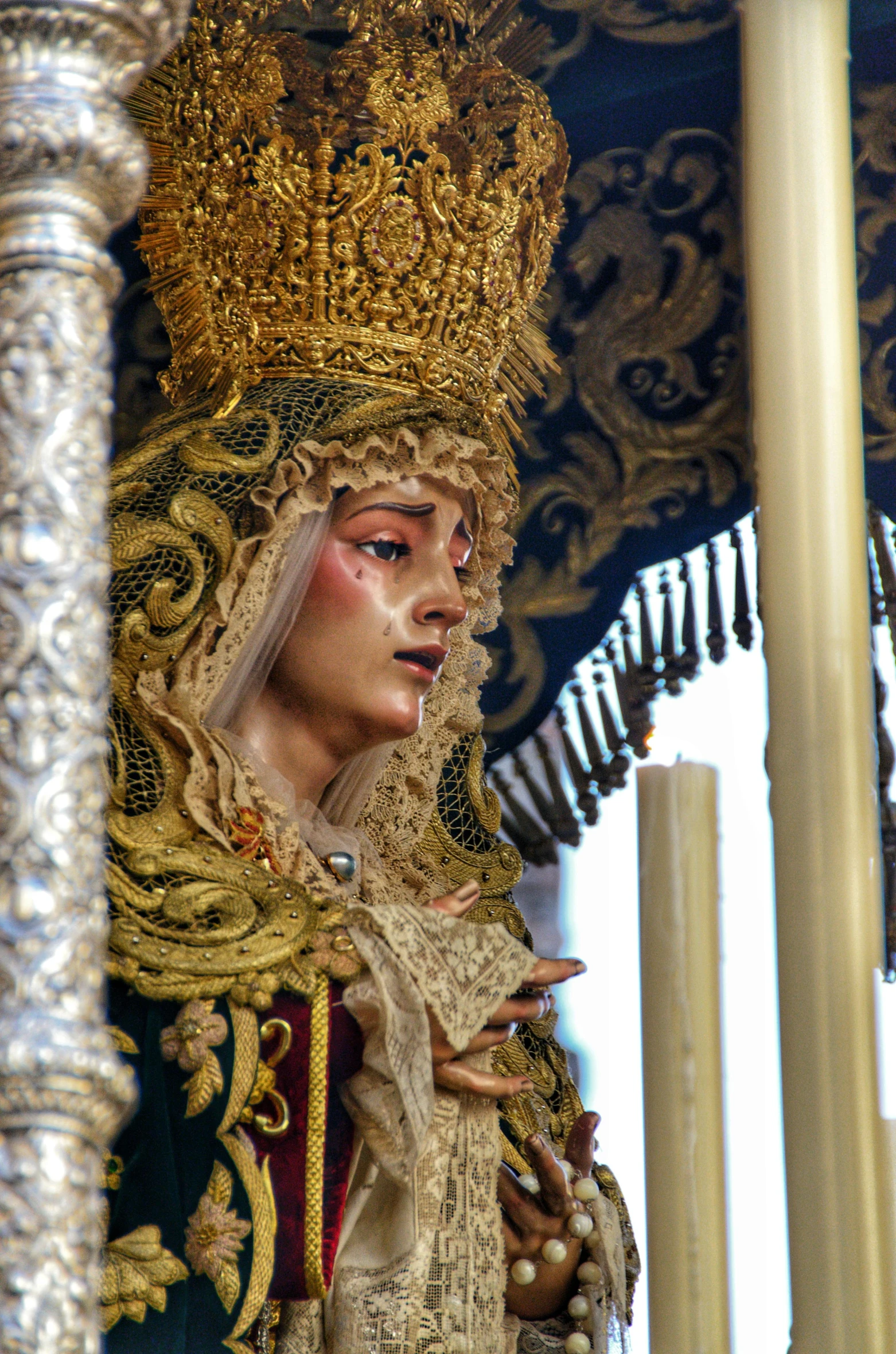 closeup of an ornately dressed doll on display