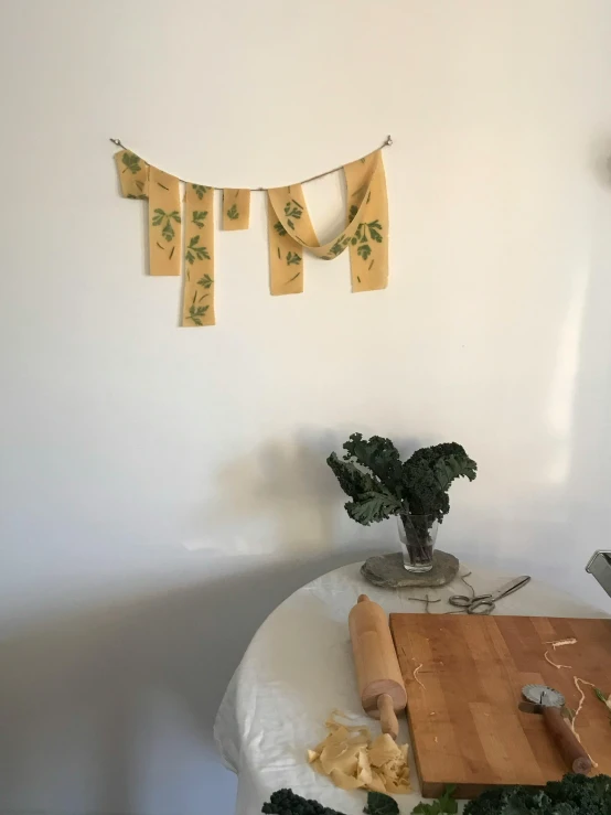 a  board and knife set up on a small table