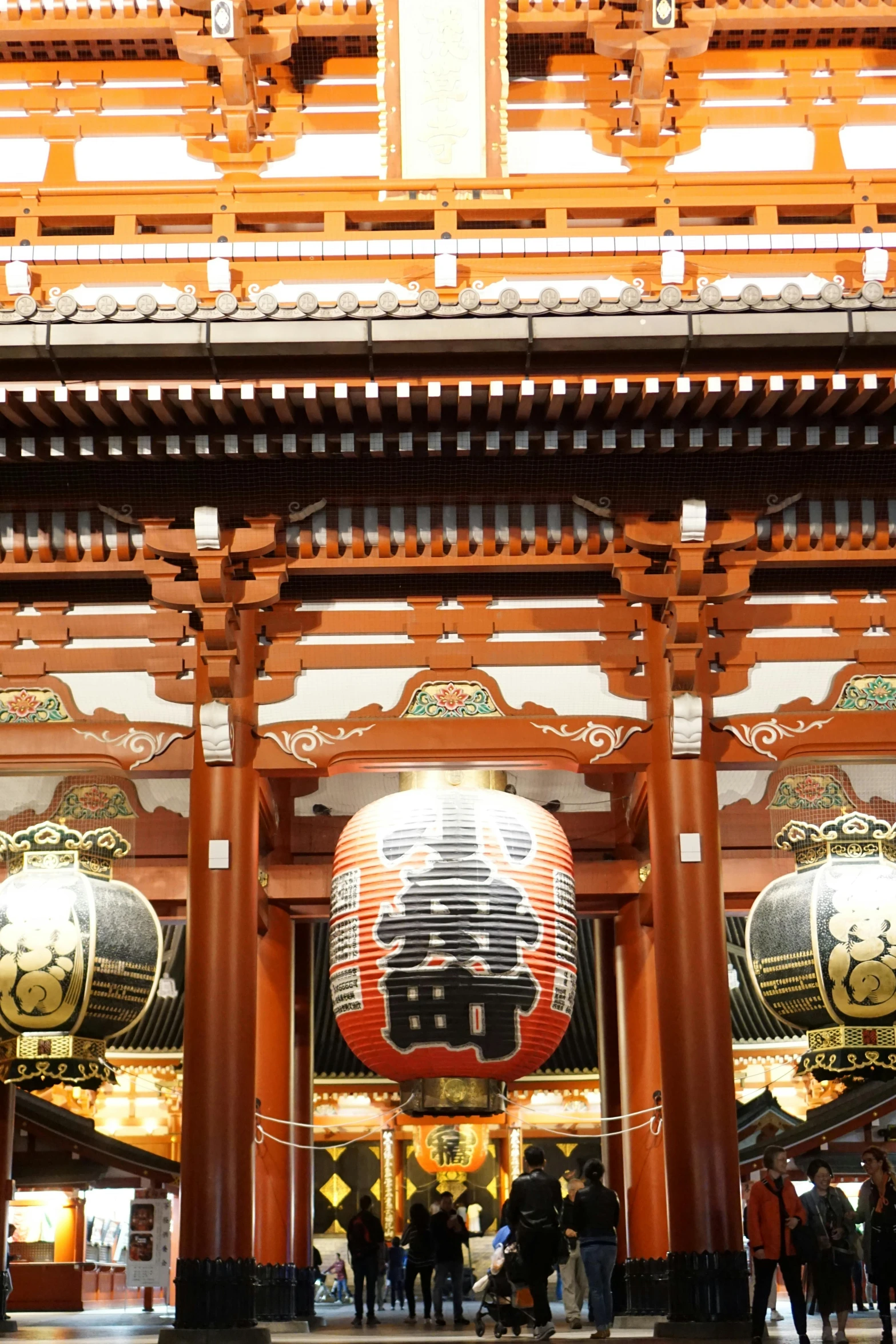 a large asian building with many tall pillars