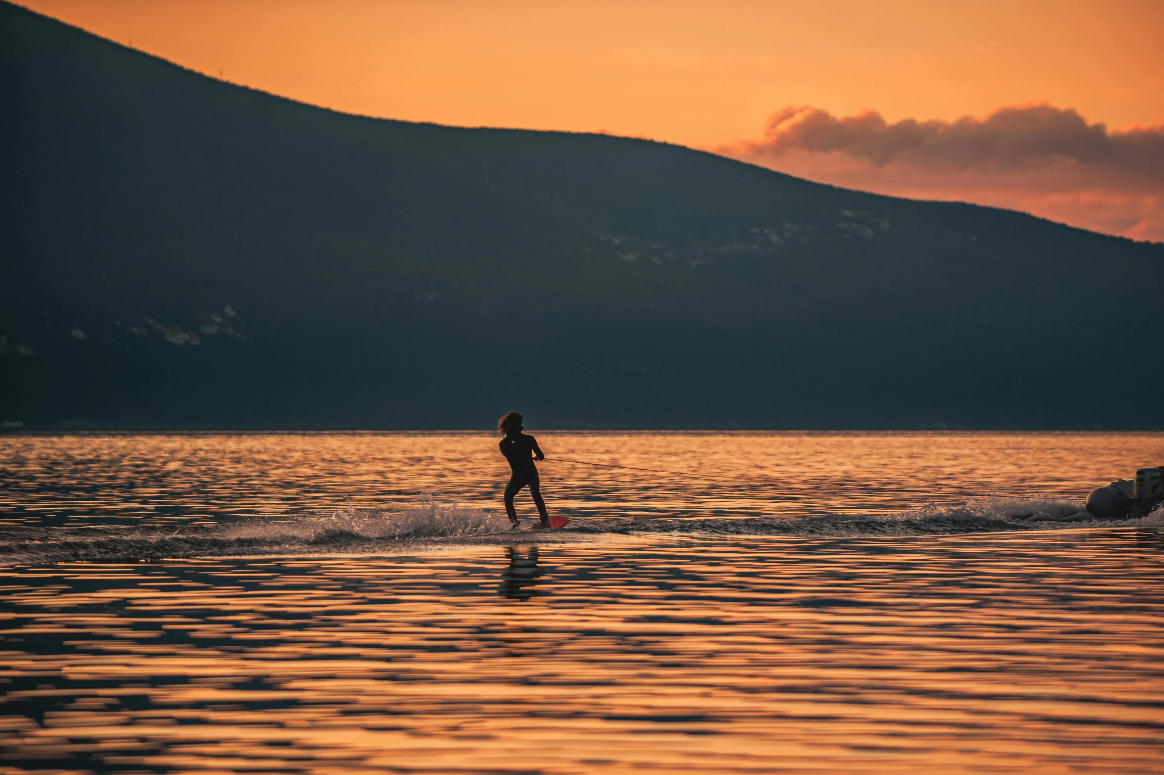 a person on a surfboard in the water