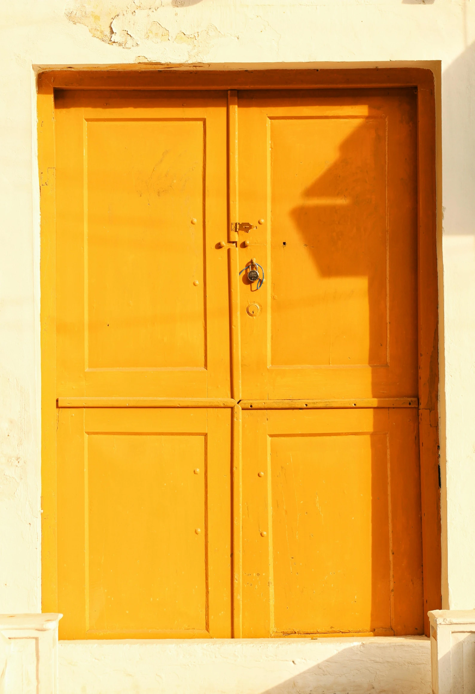 a yellow door sitting inside of a building