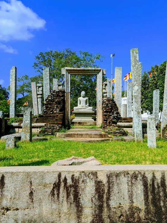 a graveyard sits in the middle of an overgrown park