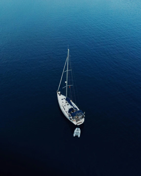 a sailboat that is out in the open water