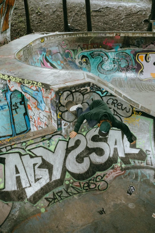 there is a young man who is skateboarding at the skate park