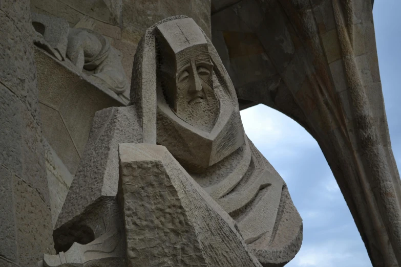 a close up of the face of a statue