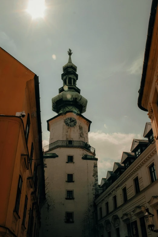 an old building with a tower and a clock on the top