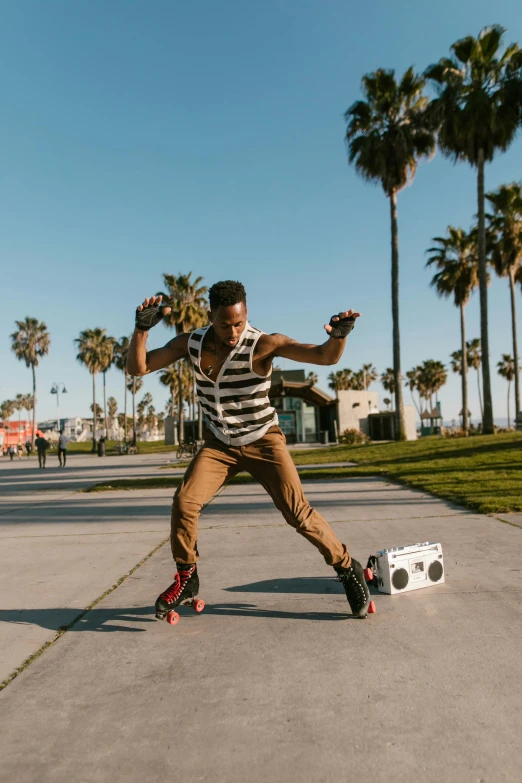 a man is skateboarding near a small object