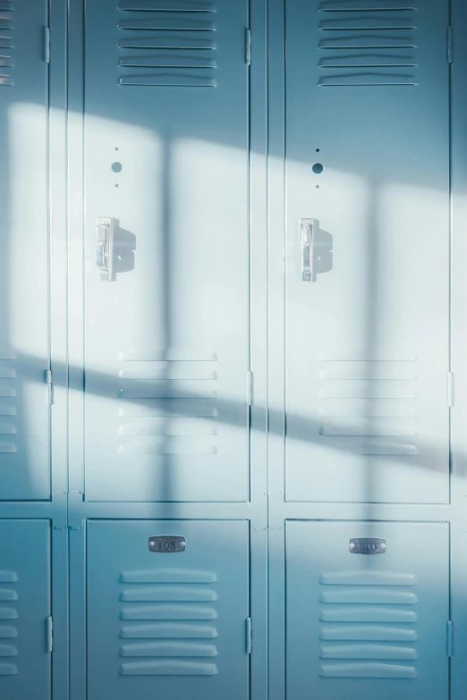 a metal locker and some windows in a building