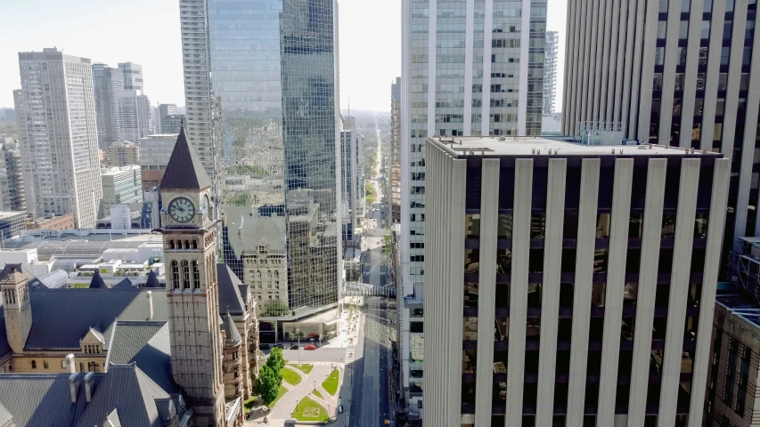 the cityscape shows a steeple on one side and the skyline on the other