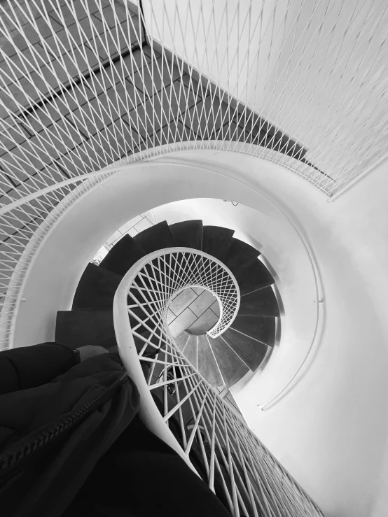 the view from the top of a spiral staircase