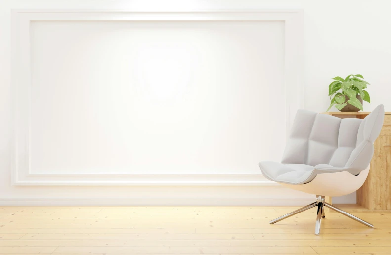 an office chair sits in front of a large white picture frame