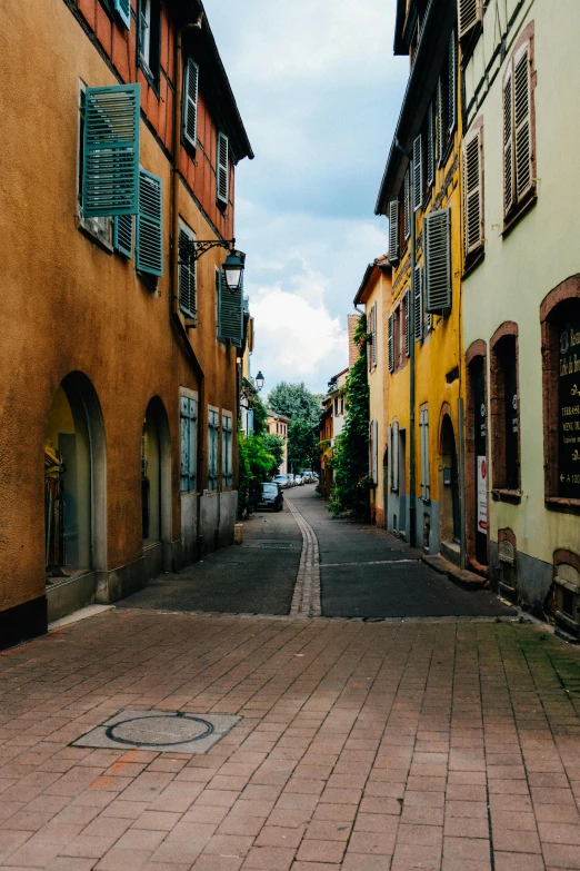 an empty road with two windows in it